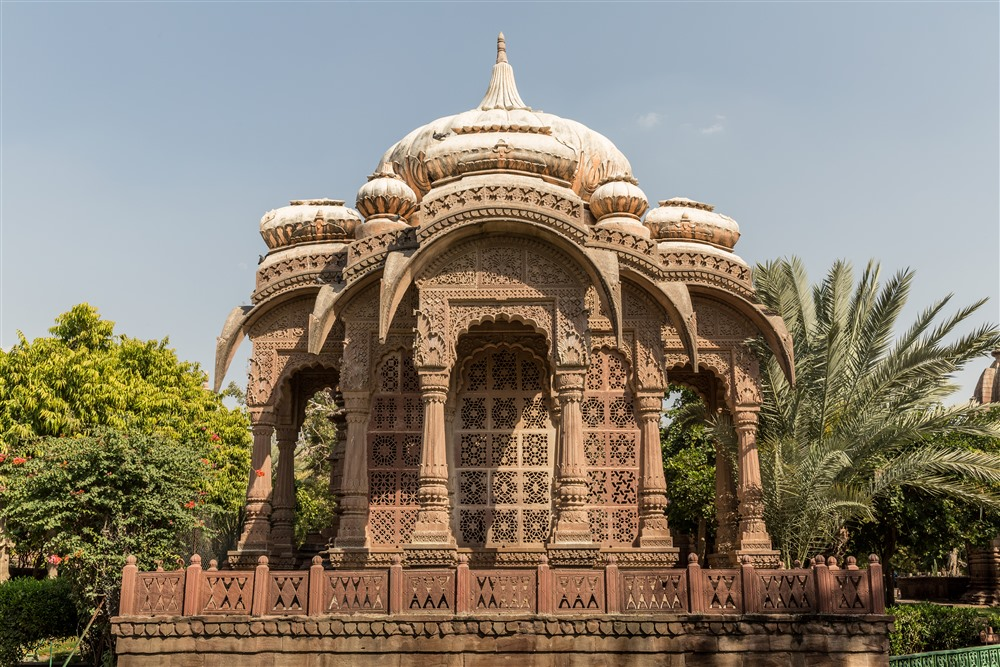 The majestic dark sandstone cenotaphs at Mandore Gardens.