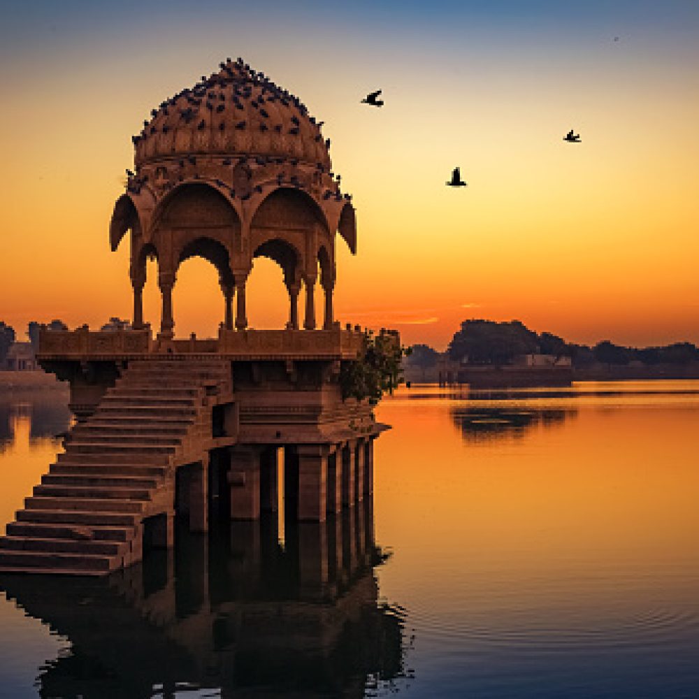 Gadisar lake (Gadi Sagar) at Jaisalmer Rajasthan is a popular tourist destination with ancient temples and archaeological ruins. Photograph shot at Gadisar lake at sunrise.